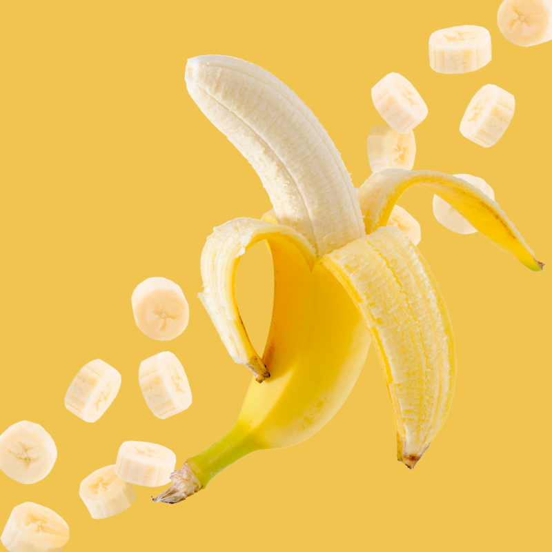 Ripe banana slices arranged on a golden yellow background highlight Wild Desert Sugar Free Dye-FREE Banana Coffee Syrup. Crafted with organic monk fruit and organic non-GMO erythritol by a family-owned business in Tucson, Arizona. This clear-pour, dye-free, sugar-free syrup delivers sweet, smooth banana flavor—perfect for coffee, lattes, teas, smoothies, desserts, and specialty drinks. Keto-friendly, low-carb, and made in small batches for gourmet quality.