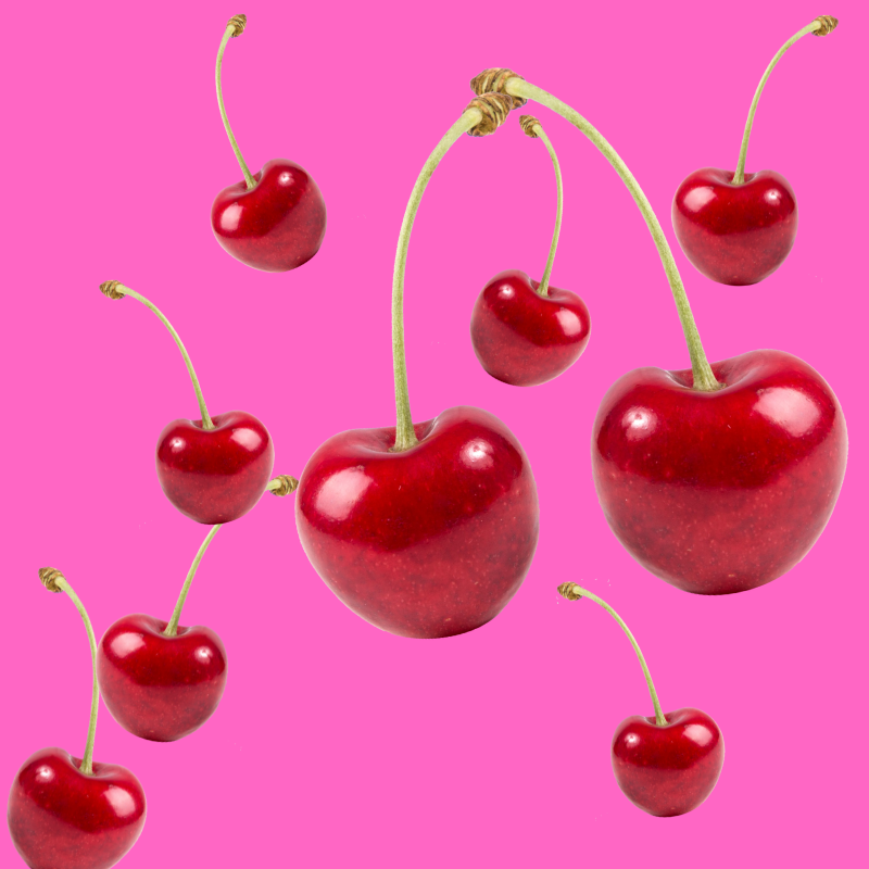 Fresh ripe cherries on a vibrant background representing Hypothermias Cherry Sugar Free Dye-FREE Slush Syrup, a keto-friendly slush mix with zero net carbs for slush machines and frozen drinks