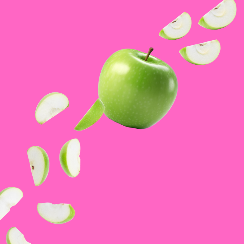 Fresh green apples on a vibrant background representing Hypothermias Green Apple Sugar Free Dye-FREE Slush Syrup, a keto-friendly fruity slush mix with zero net carbs for slush machines and frozen drinks