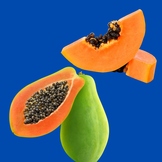 Fresh ripe papaya fruit representing Hypothermias Dye-FREE Papaya Shaved Ice Syrup, made with non-GMO 100% pure cane sugar and no colors or dyes.