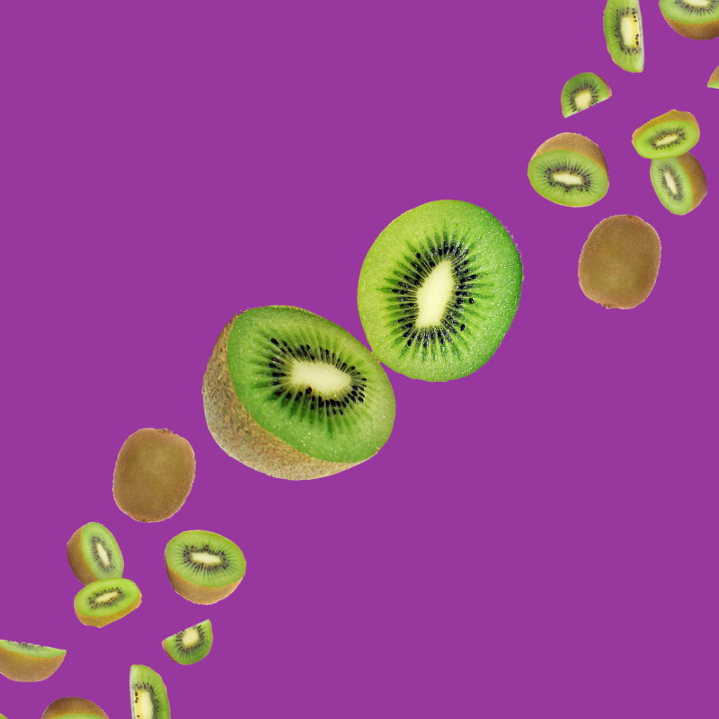 Fresh kiwi slices on a purple background representing Hypothermias Dye-FREE Kiwi Slush Syrup. Clear, dye-free syrup made with pure cane sugar for slush machines and frozen drinks.