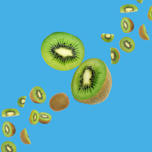 Fresh kiwi slices on a vibrant sky blue background representing Kiwi SUGAR FREE | Dye-FREE Shaved Ice & Snow Cone Syrup. Bright, sweet flavor with floral undertone, FREE & Clear, zero net carbs, sugar free, keto-friendly with organic monk fruit & erythritol.