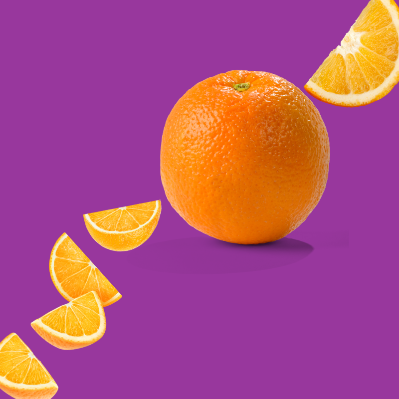 Fresh oranges on a purple background representing Hypothermias Dye-FREE Orange Slush Syrup. Clear, dye-free syrup made with non-GMO pure cane sugar for slush machines, cocktails, and frozen drinks.