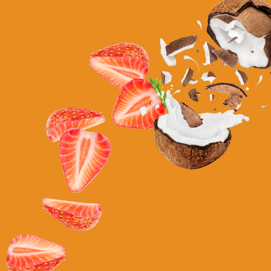 Fresh strawberries and coconut pieces on a burnt orange background representing Wild Desert Dye-FREE Tiger’s Blood Coffee Syrup. Made with non-GMO 100% pure cane sugar and crafted in small batches by a family-owned business in Tucson, Arizona. Clear pour, dye-free syrup with a sweet tropical blend of strawberry and coconut, perfect for coffee, lattes, teas, smoothies, and specialty drinks.