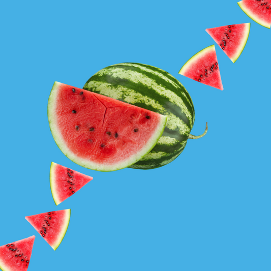 Fresh watermelon slices on a vibrant sky blue background representing Watermelon SUGAR FREE | Dye-FREE Shaved Ice & Snow Cone Syrup. Subtly sweet, refreshing flavor, FREE & Clear, zero net carbs, sugar free, keto-friendly with organic non-GMO monk fruit & erythritol.