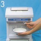 Hatsuyuki HC 8E shaved ice machine showing how to use blade adjustment knob.