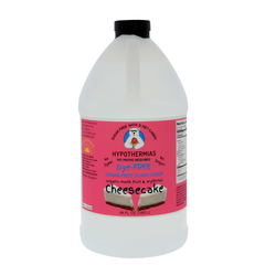 A half-gallon bottle of Hypothermias Sugar-Free & Dye-Free Cheesecake Slush Syrup with a pink label featuring a slice of creamy cheesecake, displayed on a white background. Made in small batches with organic monk fruit and erythritol for a rich, dessert-style frozen drink flavor.
