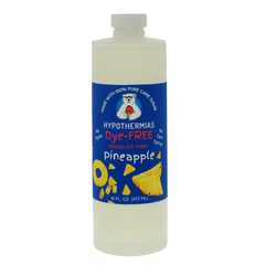 A pint of Hypothermias Dye-FREE Pineapple Shaved Ice & Snow Cone Syrup in a BPA-free plastic bottle on a bright white background, featuring a dark blue label with an image of fresh pineapple slices representing the flavor. The syrup is clear with no dyes and made from pure cane sugar and non-GMO ingredients by a family-run small business in Tucson, Arizona, USA — a UNESCO City of Gastronomy.