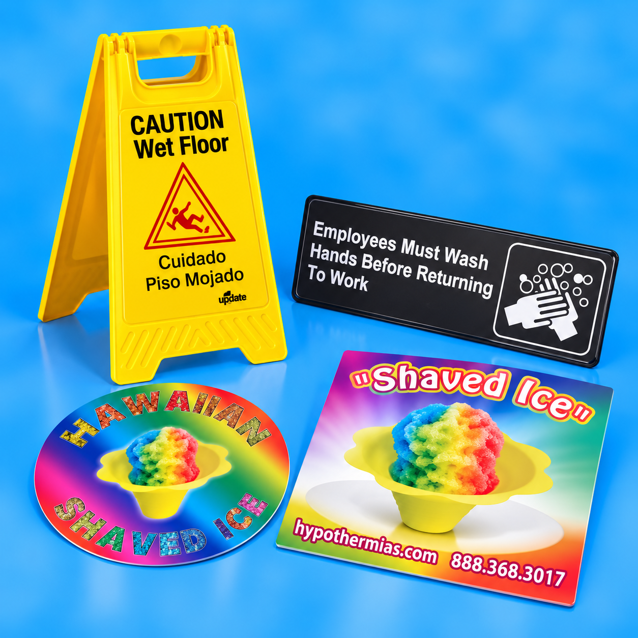 A set of custom printed signs and decals featuring a rainbow-colored shaved ice product. The set includes a yellow caution wet floor sign, a black hand-washing instruction sign, a circular rainbow sticker, and a rectangular rainbow decal with the text 'shaved ice' and a yellow cup graphic.